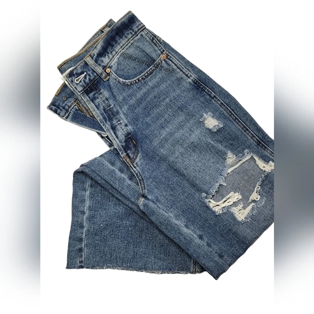 Women's Distressed Blue Jeans